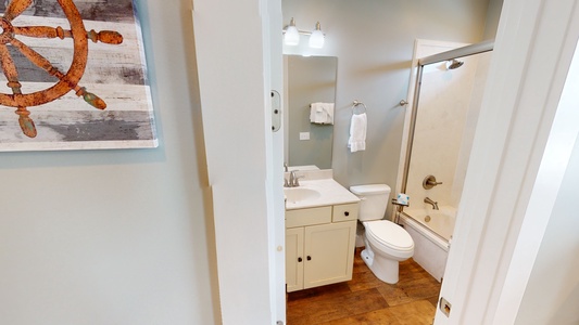 The private bathroom in bedroom 5 has a tub/shower combo