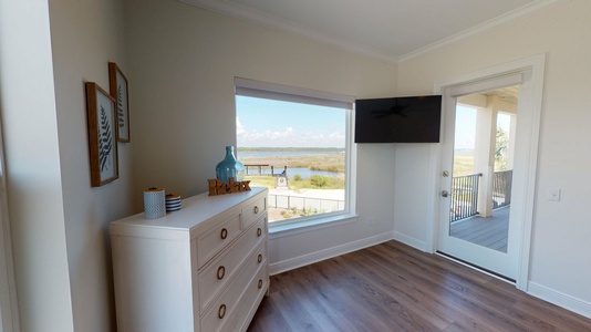 Bedroom 5 with a flat screen TV