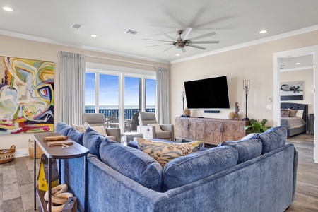 Open concept living with a large mounted TV