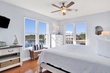 The Master bedroom has a television and a private bathroom