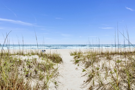 Steps to the sugar white sand and sparkling Gulf