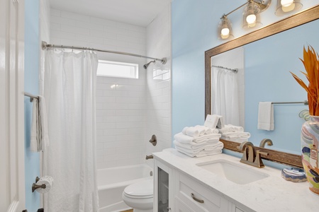 1st floor guest bathroom with tub/shower combo