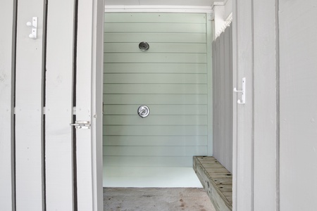 Private outdoor shower under the home