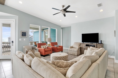 Living area with sectional and TV