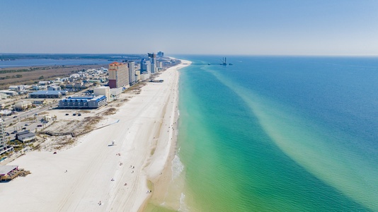 he beautiful Gulf of Mexico and the white sandy beach are just steps away