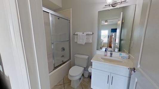 Attached bath to Bedroom 2 with a tub/shower combo