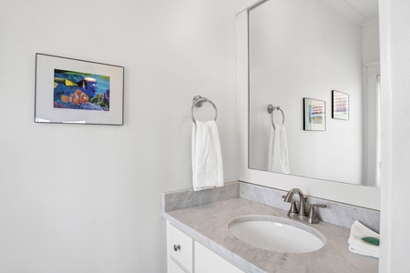Half bathroom accessible from Bedroom 5