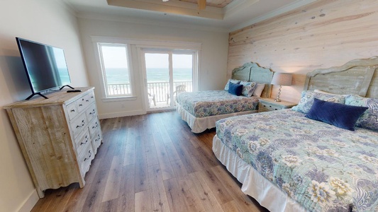 Bedroom 6 has a TV, Gulf views, balcony access and a private bathroom