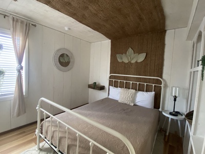 Main level, Bedroom 2, queen bed, shares hall bath with bedroom 3