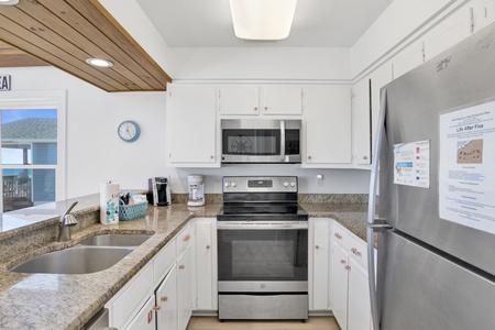 Kitchen with stainless appliances and granite countertops