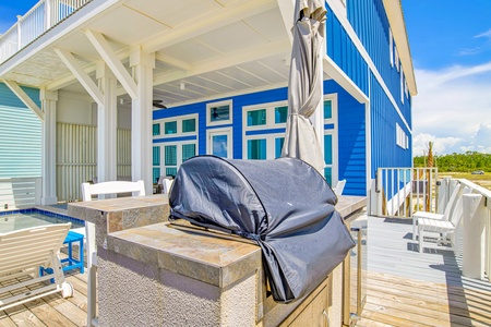 Poolside gas grill and mini fridge