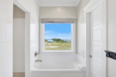 A large soaking tub in the master bath