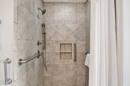 Shower with grab bars in the master bath