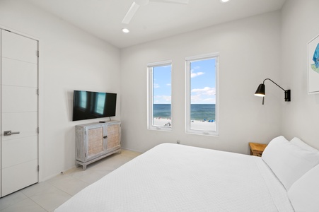 Bedroom 4 has a TV, Gulf views and a private bathroom