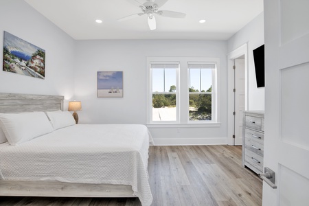 Summertime Blues I-Bedroom 3 on the 2nd floor with a queen bed, Gulf views, ceiling fan, TV and a private bathroom