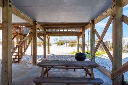 Shaded picnic area under the house with gorgeous views of the beach!