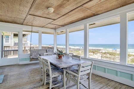 Beautiful covered, screened in porch to enjoy to views