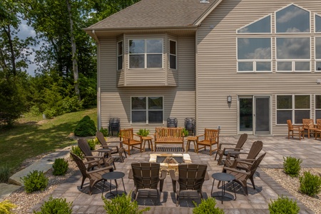 Gather around the outdoor firepit in the evenings with enough seating for everyone in the group