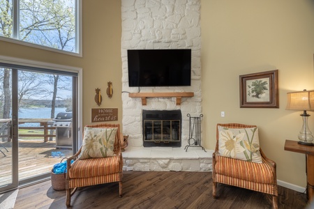 Cozy up in front of the gorgeous floor to ceiling fireplace