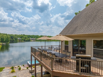 Enjoy breakfast or the sunset from the homes private deck overlooking Lake Charrette