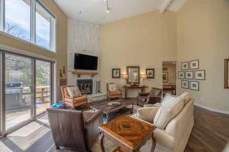 Enjoy spending time in the spacious living room with seating areas, surrounded by waterfront views