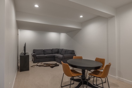 A bonus room in the lower level can be made into a quiet office space, a game room, or a play room for the kids
