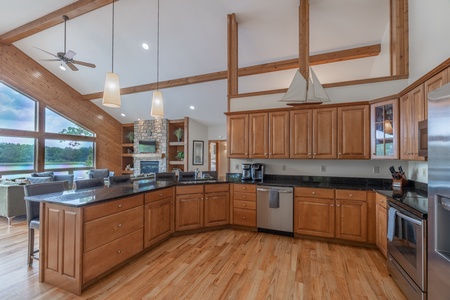 The beautiful oversized kitchen is fully equipped with stainless steel appliances and all the utensils for your cooking needs