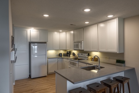 Recently remodeled kitchen with new appliances and marble countertops!