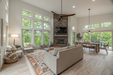 Cozy up by the 42 inch corner fireplace, featuring stone from floor to ceiling