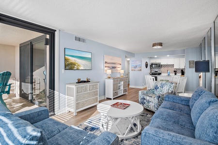 Relax in your coastal haven with ocean-blue sofas, a bright open kitchen, and direct balcony access. Let the beach vibes and warm sunlight make you feel instantly at home.