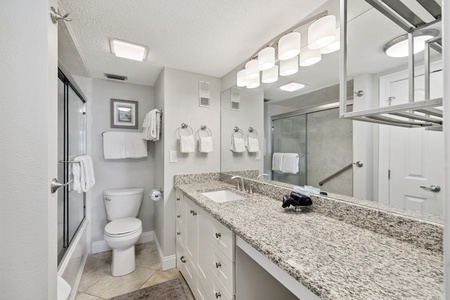 Primary Bathroom with Shower Tub Combination