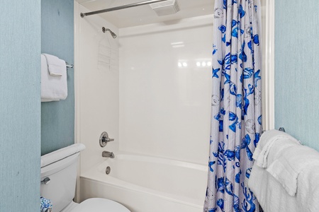 Primary Bathroom with Shower Tub Combination