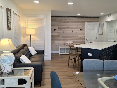 Sitting Area, Entryway and Dining Area