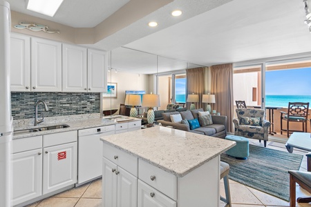 Prepare meals while gazing at endless ocean views from your fully equipped kitchen with granite counters and modern appliances.