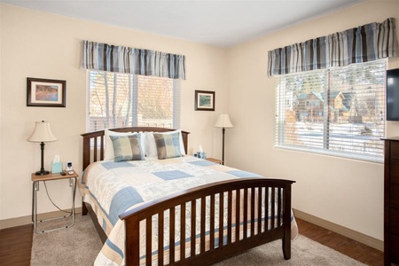 First bedroom downstairs with queen bed