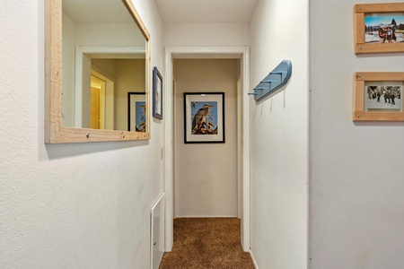 Hallway to other downstairs rooms