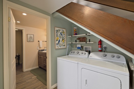 Never worry about packing light—your own private washer and dryer make laundry day effortless. Tucked neatly under the stairs, this convenient space keeps everything you need within easy reach during your stay.