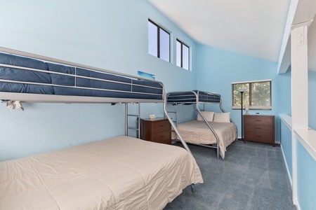 Loft with two sets of extra long bunks beds