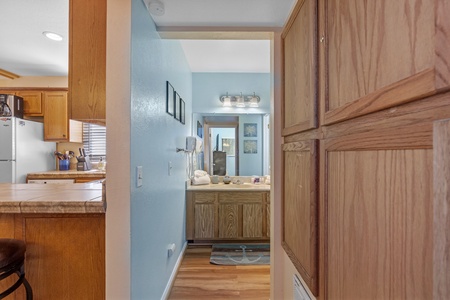 Bathroom attached to primary room and shared with living space