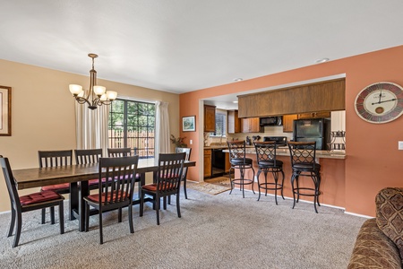 Dinning area with counter barstools for more seating