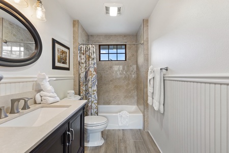 Full shared bathroom for second and third bedrooms