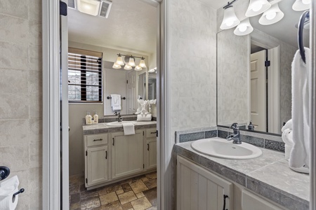 Communal bathroom attached to bedroom