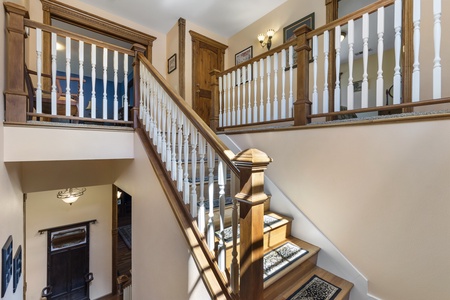 Stairs to the three upstairs bedrooms