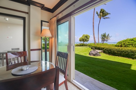 Your ground floor getaway with palms, ocean breezes, and just steps to the sand