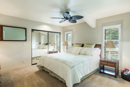 Beautiful, spotless master bedroom with private en suite bath and shuttered windows