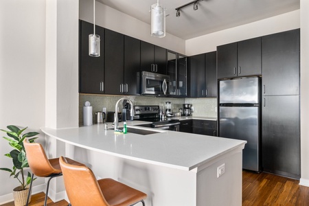 Create magic in this contemporary kitchen with all the necessary amenities.