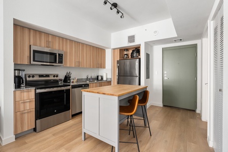 Cook up a storm in this contemporary kitchen with all the necessary amenities.