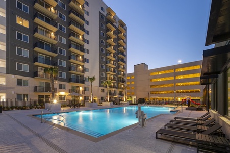 The community features a pool with communal grills and a kids' play area