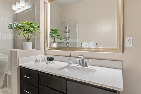 Prepare for the day in the modern bathroom with complimentary toiletries.