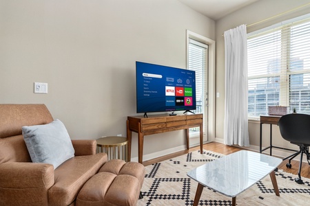 Tune in to your favorite shows with the smart TV and sound system for streaming.